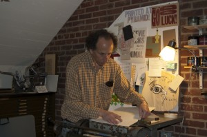 Lining up the paper on the "gripper"